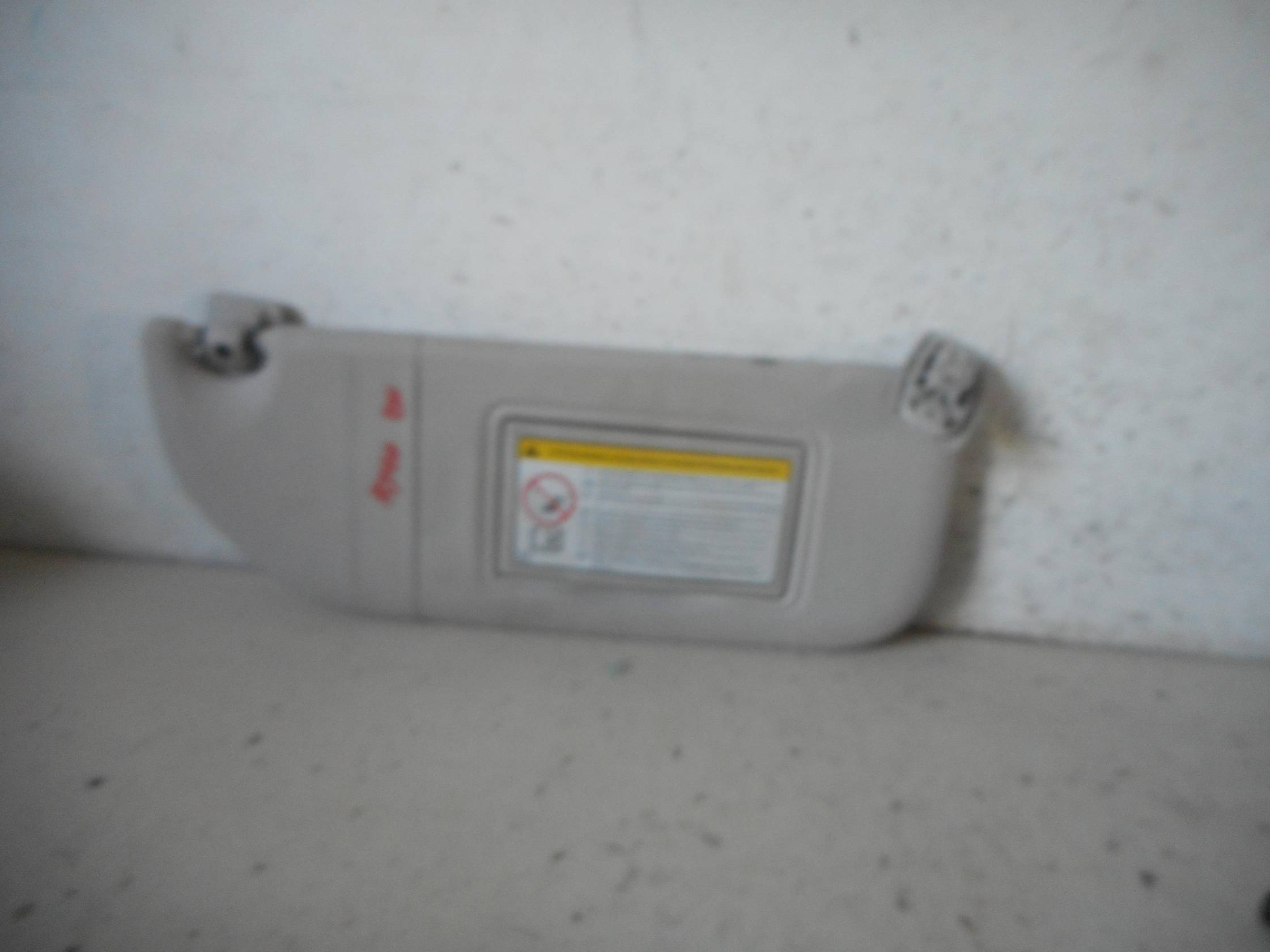 Aletta parasole parabrezza dx.